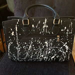 Cool black leather bag with rock and roll vibes